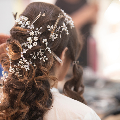 Female getting hair done