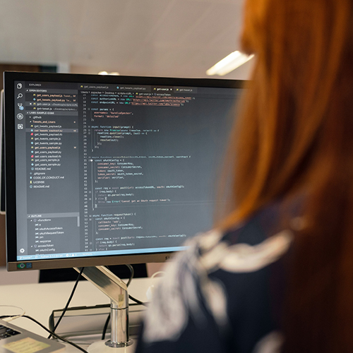 A person looking at a computer screen