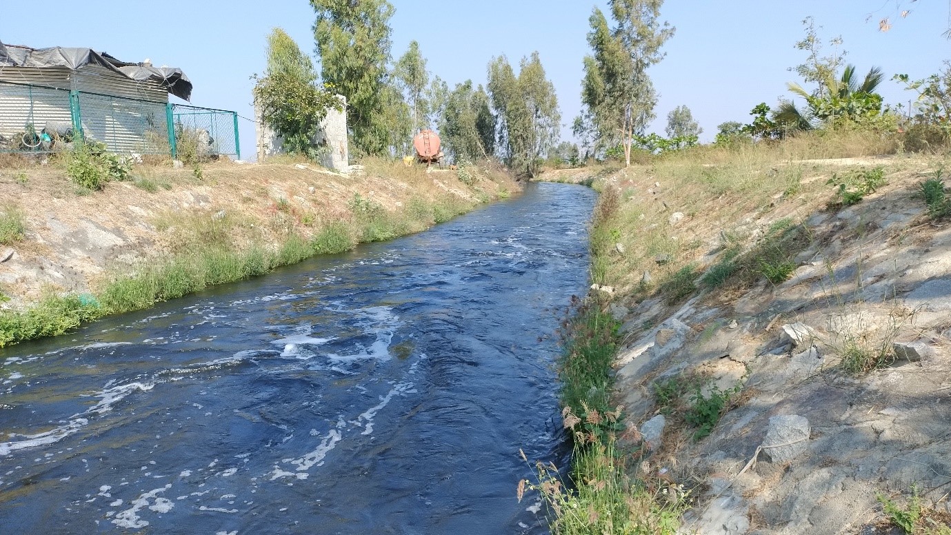 Picture of a water channel in India connecting lakes